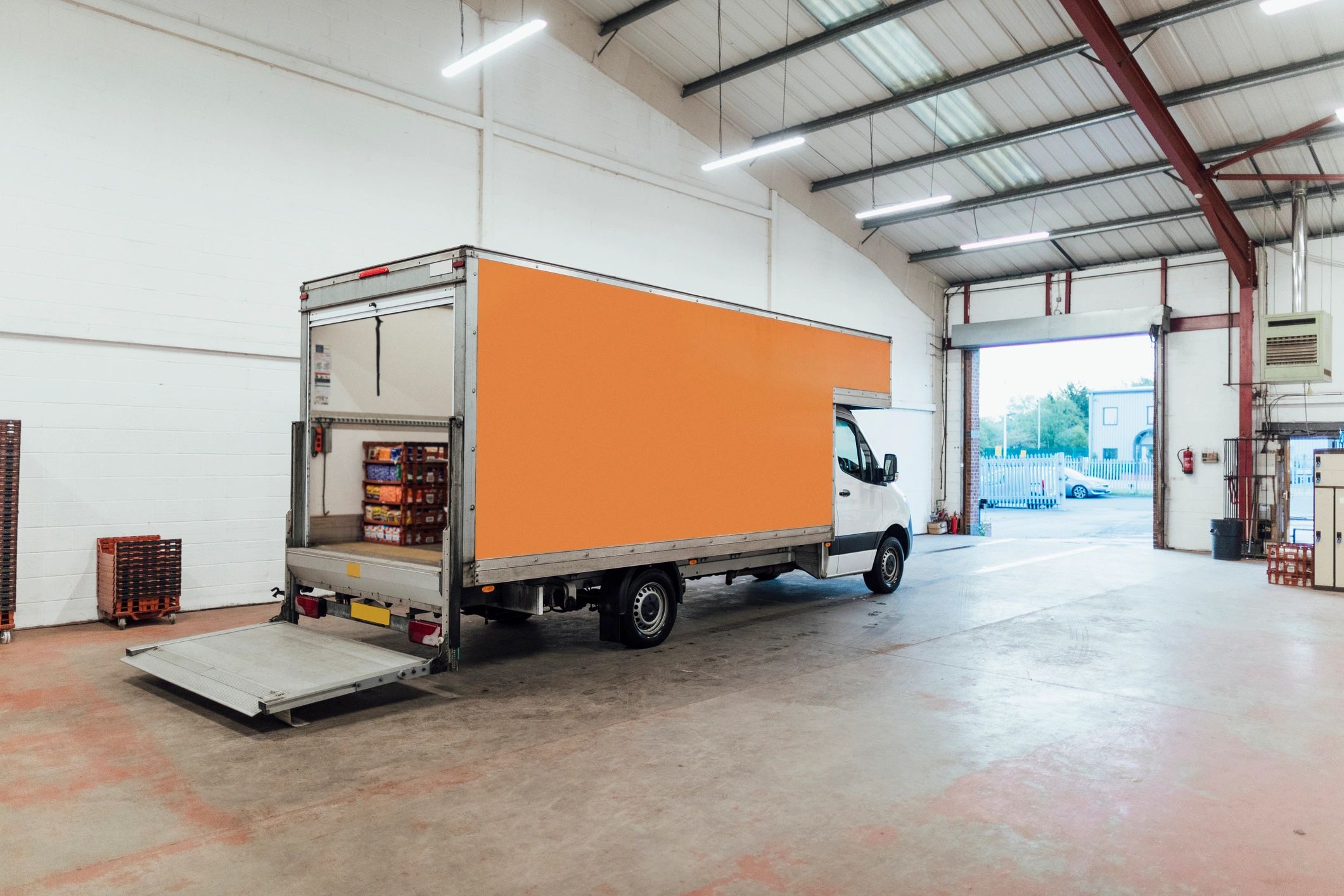 Goods vehicle ready for loading at a logistics facility