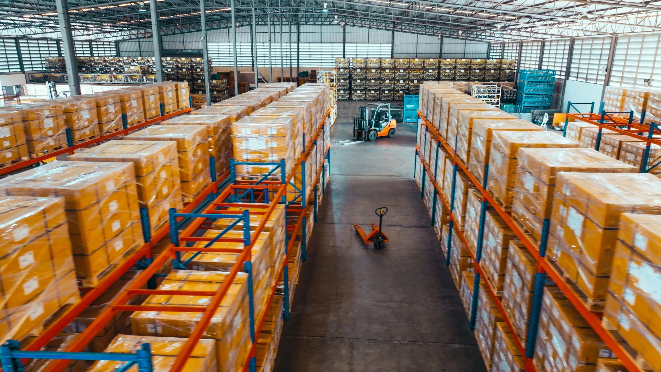 Warehouse shelving filled with packaged goods for logistics operations