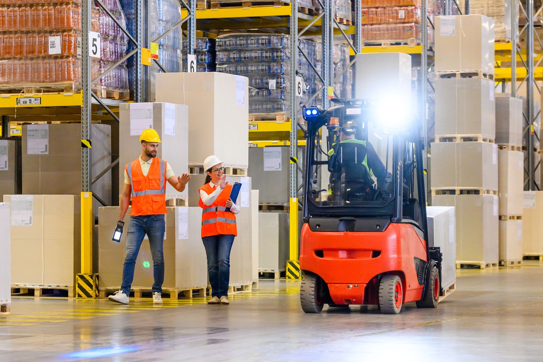 Warehouse logistics team coordinating deliveries